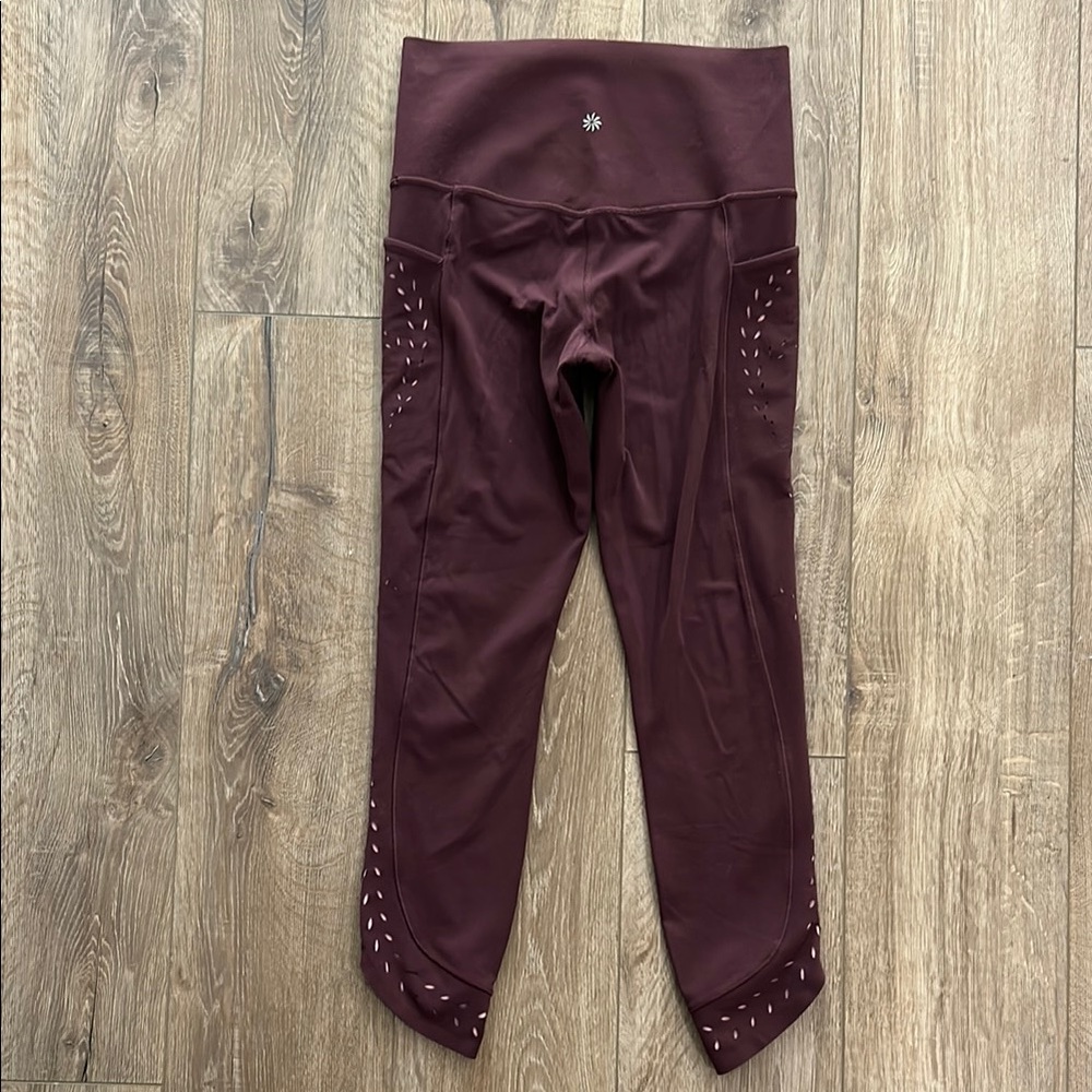 Worn once - ATHLETA Salutation Stash Pocket Laser Cut 7/8 Tights